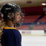 Photo by Rashah McChesney/Peninsula Clarion  Kylie Morse watches her U16 girls hockey team practice Friday March 14, 2014 at the Soldotna Sports Center in Soldotna, Alaska. The team has made it to nationals and will be travelling to New York to play.