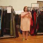 Photo by Kelly Sullivan/ Peninsula Clarion  "I think this is the perfect color for me," said Nicole Kreider after choosing her favorite dress, Tuesday, March 18, at Cinderellas Closet in Soldotna Highschool.