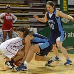 Soldotna High School senior Makayla Wong pressures an East player during their 4A girls consolation bracket game in the ASAA state basketball tournament at Anchorage's Sullivan Arena on Friday.