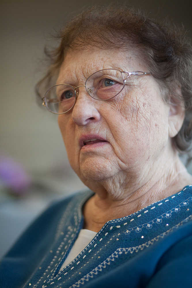 Photo by Rashah McChesney/Peninsula Clarion  Jim Evenson imitates the ground pitching and rolling as he talks about experiencing the Good Friday Earthquake in Nikiski, Alaska.