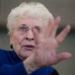 Photo by Rashah McChesney/Peninsula Clarion  Mavis Cone recalls her memories of the 1964 Good Friday Earthquake with a group at the Kenai Senior Center.