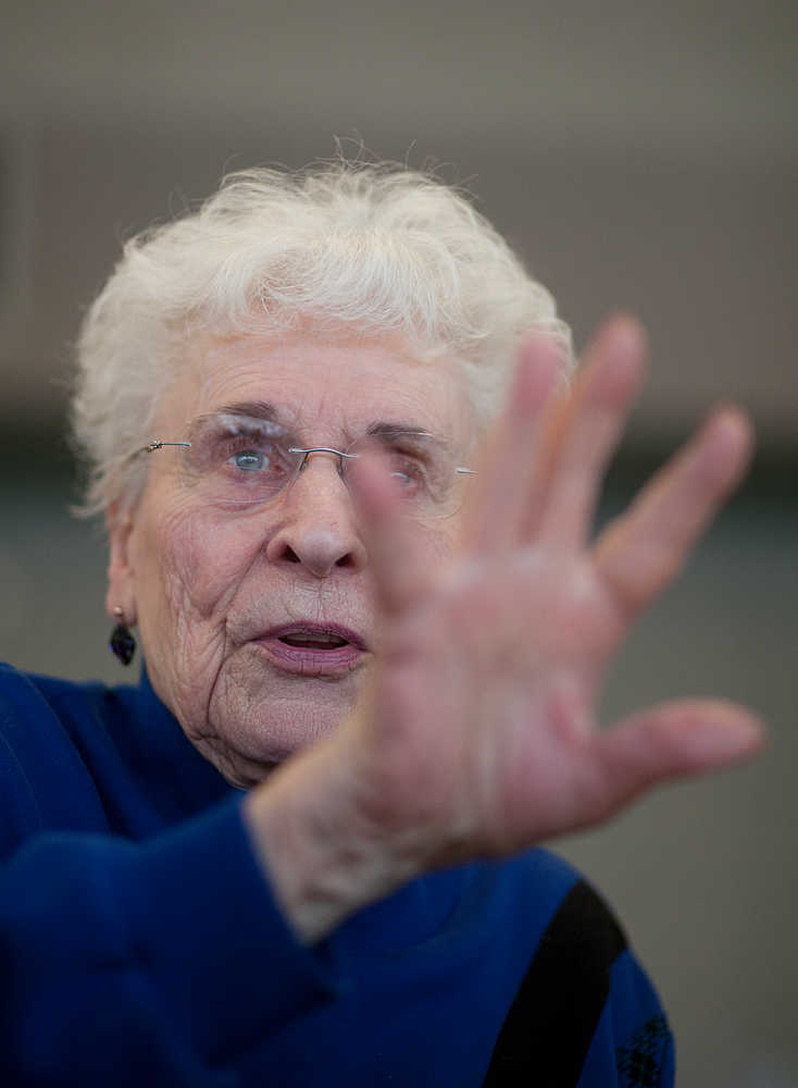 Photo by Rashah McChesney/Peninsula Clarion  Mavis Cone recalls her memories of the 1964 Good Friday Earthquake with a group at the Kenai Senior Center.