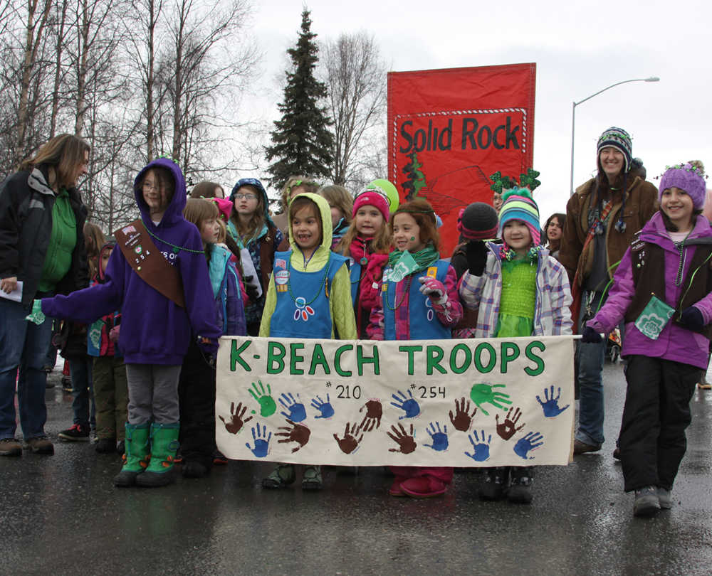 Snow Squall holds as 23rd St. Patrick's Day parade passes by