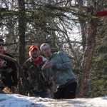 Bryan Hahn of Soldotna aims for the basket on the Kenai Eagle Disc Golf Course Monday afternoon in Kenai. Hahn was playing the course along with Jarrett Urban and Connor Schoessler.