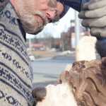 Photo by Rashah McChesney/Peninsula Clarion  Peter Quinn works on a sculpture as an apprentice with Derrick Stanton Log Works Tuesday March 25, 2014 at a temporary shop set up along the Sterling Highway in Soldotna.