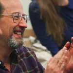 Photo by Kelly Sullivan/ Peninsula Clarion Dr. Paul Landen claps for the final speaker at the Alaska Native Oratory Society, Friday, March 28, at Kenai Peninsula College