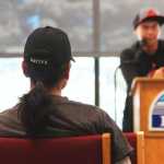Eugene Stevens watches James Oaks speak at the Alaska Native Oratory Society, Friday, March 28, at Kenai Peninsula College.