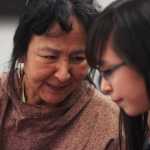 Photo by Kelly Sullivan/Peninsula Clarion Sandra King, a teacher on leave from the Lower Kuskokwim school district talks to Jayne Hanna, 14, during the 6th annual Alaska Native Oratory Society regional open mic session