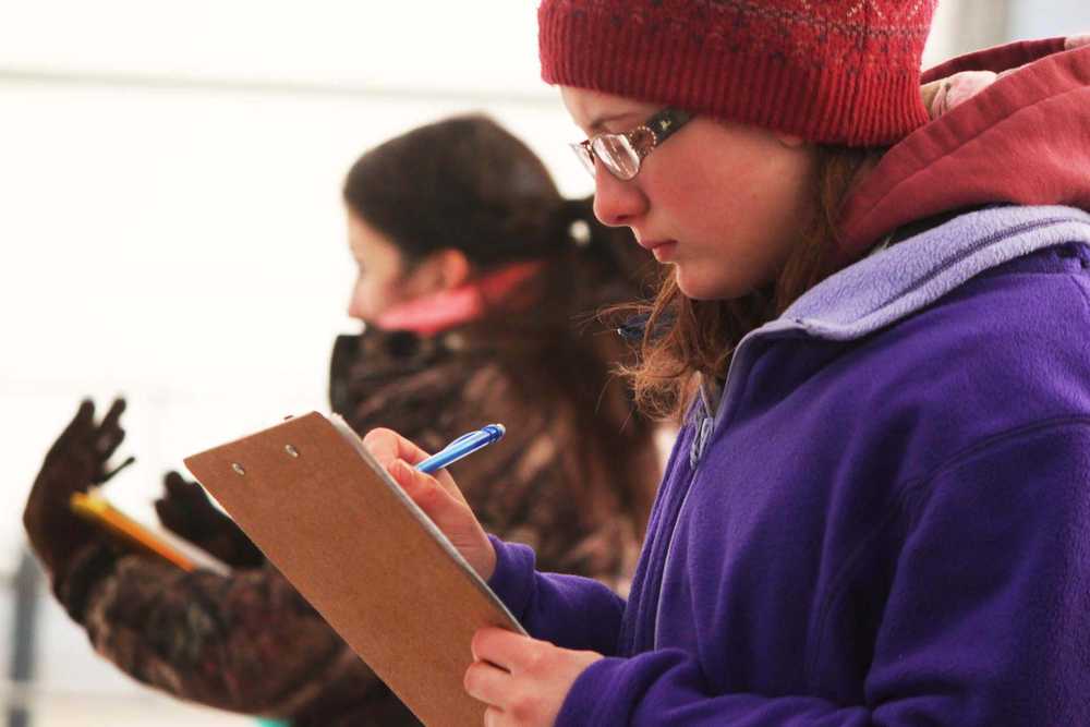 Photo by Kelly Sullivan/ Peninsula Clarion Hailey McNabb silently takes makes observations during the 4H Horse Contest, Friday, April 11, at the Solid Rock Bible Camp.