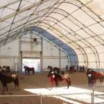 Photo by Kelly Sullivan/ Peninsula Clarion Horses are lined up behind participants who are asked to face the wall until the all the animals are situated correctly, Friday, April 11, at the Solid Rock Bible Camp.