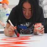 Photo by Kelly Sullivan/ Peninsula Clarion Alaska State Council on the Arts and the Nikiski Recreation Center paid for the Nikiski community mural's materials that were used on Friday and Saturday, April 11 and 12, at the Nikiski Recreation Center. Nikiski community mural were funded by