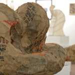 Photo by Rashah McChesney/Peninsula Clarion  Kenai Peninsula College, Kenai River Campus student Chelsea Springer's "Disguise" dominates the Gary L. Freeburg art gallery during the student art show April 16, 2014 in Soldotna, Alaska. Springer and 28 other students are featured in the show which will run through May 2 in the Brockel building.