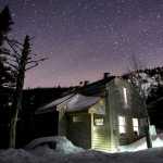 In this Thursday, April 3, 2014 photo, stars fill the sky above the Gray Knob cabin, a first-come, first-served hiker's camp located just below the tree line, 3.2 miles from Route 2 in Randolph, N.H. The cabin is one the Randolph Mountain Club's remote facilities open to hikers in the Northern Presidential Range. (AP Photo/Robert F. Bukaty)