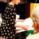 Photo by Kelly Sullivan/ Peninsula Clarion Skyview high school students Austin Craig, Aurora Deflinger, and Morgan Chesley prepare for their presentation on Books for Africa that won them fourth place at the 24th annual CFK competition, Thursday, April 17, at Kenai Central High School.