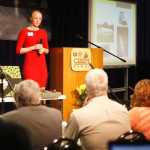 Photo by Kelly Sullivan/ Peninsula Clarion Homer high school student Elise Webber, the 2013 CFK first place winner, was part of the judges panel a the 24th annual Caring For Kenai, Thursday, April 17, at Kenai Central High School.