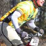 Photo by Kelly Sullivan/ Peninsula Clarion Anthony Murray rode through rough, muddy pools of melting ice on Wolverine trail, Saturday, April 19, at the Tsalteshi Trail.