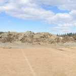 Photo composite by Rashah McChesney/Peninsula Clarion  This composite of several images shows the excavation of a Soldotna High School field Tuesday April 22, 2014 in Soldotna, Alaska.