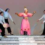 Photo by Dan Balmer/Peninsula Clarion Nikiski senior Hannah Tauriainen performs the lead role of Dolly Levi in the musical, "Hello Dolly" during a dress rehearsal Tueday at Nikiski High School. The drama class is putting on the production with shows Friday and Saturday at 7 p.m. and the following weekend May 2,3 at 7p.m. at the Nikiski High School auditorium.