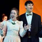 Photo by Dan Balmer/Peninsula Clarion Nikiski seniors Hannah Tauriainen and Richard Vollertsten sing the finale of "Hello Dolly" during a dress rehearsal Tuesday. Vollertsten plays Horace Vandergelder, a rich, gruff widower looking for a wife. Tauriainen plays Dolly Levi, a widow and a matchmaker.