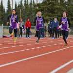 Photo by Rashah McChesney/Peninsula Clarion  Several runners take off during a track meet Saturday April 26, 2014 at Kenai Central High School in Kenai, Alaska.