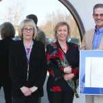 Photo by Kelly Sullivan/ Peninsula Clarion After Robia Bishops ceremonial installment, Sherril Behm and Ronald Haberman joined her outside the Post Office, Wednesday, April 30, in Soldotna.