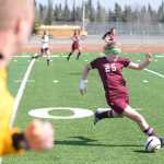 Photo by Rashah McChesney/Peninsula Clarion  Grace Christian's Laura Aspelund catches up with the ball and moves to change directions during their game against Kenai Central High School Saturday May 3, 2014 in Kenai, Alaska.