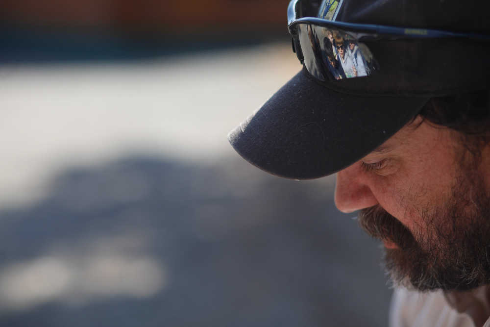 Photo by Rashah McChesney/Peninsula Clarion  Todd Eskelin, wildlife biologist at the Kenai National Wildlife Refuge talks to a group of grade-school students during the first Youth Game Warden Camp at the refuge Saturday May 3, 2014 in Soldotna, Alaska.