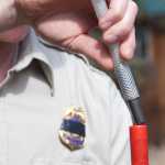 Photo by Rashah McChesney/Peninsula Clarion Dave Bolin, refuge operations specialist at the Alaska Martitime National Wildlife Refuge, uses a tool to check the contents of a shotgun shell Saturday May 3, 2014 during a Youth Game Warden camp at the Kenai National Wildlife Refuge headquarters in Soldotna, Alaska.