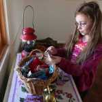 Photo by Kelly Sullivan/ Peninsula Clarion Marge Mullen told the students of Shaya Straw's third grade Soldotna Elementary School class tree stumps were used as chairs in old houses, Thursday, May 8, at the Soldotna Historic Post Office.