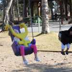 Photo by Dan Balmer/Peninsula Clarion Addison, 3, and Brayden, 1, Cramer on the swing set at Municipal Park Thursday. Their mother Angie Cramer is working with other moms from Kenai and the parks and recreation commission to develop new playground equipment for kids ages 2-5 with the hope the park could be completed next spring.