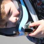 Photo by Kelly Sullivan/Peninsula Clarion Angelina Bond was prepared for the bright sunshine that beat down on the Bike Rodeo, Friday, May 9, at Mountain View Elementary School.