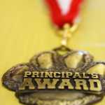 Photo by Kelly Sullivan/Peninsula Clarion Josh Pieh won the principles award this year for recieving the most reading points over the course of the year, Friday, May 9, at Soldotna Elementary School.