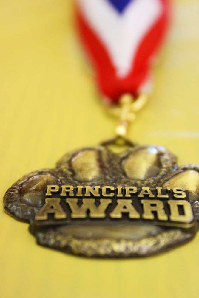 Photo by Kelly Sullivan/Peninsula Clarion Josh Pieh won the principles award this year for recieving the most reading points over the course of the year, Friday, May 9, at Soldotna Elementary School.