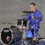 Photo by Dan Balmer/Peninsula Clarion Timothy Hills performs a drum solo during the Cook Inlet Academy graduation ceremony Sunday. Hills is one of 13 graduates in CIA's 2014 class. He plans to attend the University of Colorado, Colorado Springs to pursue a degree in mechanical or electrical engineering.