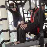 Photo courtesy Kenai National Wildlife Refuge Taylor Gregory, a U.S. Fish & Wildlife Service technician, prepares to be dunked in the "Home Depot 2000" at the Nikiski Pool.