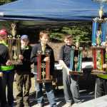 Kenai Soap Box Derby winners show off their hardware.