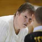 Photo by Rashah McChesney/Peninsula Clarion  Mountain View Elementary school principal Norma Holmgaard listens as a student tells a story during lunch time May 16, 2014 in Kenai, Alaska. Holmgaard is leaving the Kenai Peninsula Borough School District at the end of the 2013-14 school year.