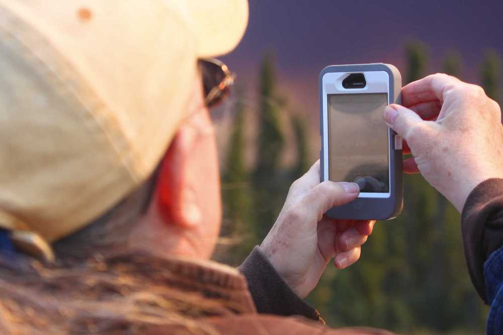 Photo by Rashah McChesney/Peninsula Clarion  Flames eat through the Kenai National Wildlife Refuge on the western edge of the Funny River fire Tuesday May 20, 2014 near Kasilof, Alaska. The fire, which firefighters started battling late Monday has spread to consume more than 7,000 acres, stretches nearly 10 miles long and about 1 mile wide.