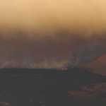 Photo by Rashah McChesney/Peninsula Clarion  Smoke from the Funny River Fire shot more than 8,000 feet in the air Tuesday May 20, 2014 as the fire spread to consume nearly 7,000 acres of Kenai National Wildlife Refuge land in less than 24 hours. Dry, windy conditions have exacerbated the fire conditions spreading it into a line stretching more than 10 miles long and about 1 mile wide.