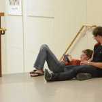 Photo by Rashah McChesney/Peninsula Clarion  Jasmyn Foost and Austin Schrader, both freshman, sit by a stairwell on the last day of school Wednesday May 21, 2014 at Skyview High School in Soldotna, Alaska.