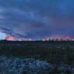 Photo by Rashah McChesney/Peninsula Clarion  The Funny River fire burns in the distance Wednesday May 21, 2014 in Kasilof, Alaska.