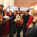 Photo by Kelly Sullivan/Peninsula Clarion Graduating KCHS seniors pose with family and friends after their ceremony, Wednesday, May 21, at Kenai Central High School.