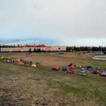 Photo by Rashah McChesney/Peninsula Clarion  Fire crews tasked with fighting the Funny River fire set up camp in a field behind Skyview High School Thursday May 22, 2014 in Soldotna, Alaska.