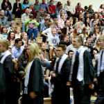 Photo by Rashah McChesney/Peninsula Clarion  A crowd cheers wildly for the newly graduated class of 2014 Nikiski Middle-High School students Monday May 20, 2014 in Nikiski, Alaska.