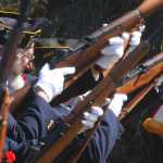 Photo by Kelly Sullivan/Peninsula Clarion Local veterans fired the gun salute in the Soldotna Community Memorial Park ceremony, Monday, May 26, in Soldotna.