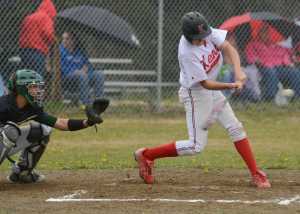 Photo by Rashah McChesney/Peninsula Clarion Kenai's Nate O'Lena swings and misses during their game against Colony Thursday May 29, 2014 during the Northern Lights Conference in Soldotna, Alaska.