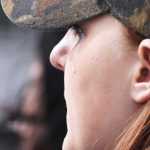 Photo by Kelly Sullivan/ Peninsula Clarion Brooke Jackson lost her father to non-small cell lung cancer. She cried during the opening ceremony, Friday, May 30, at the Central Peninsula Relay for Life.
