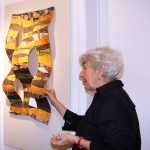 Photo by Dan Balmer/Peninsula Clarion Marilyn Kay Johnson examines a 3-D quilt made by Jan Wallace at the Kenai FIne Arts Center Wednesday, two days before the opening of the Quilt Art Show in Kenai.