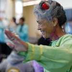 Photo by Rashah McChesney/Peninsula Clarion Nancy Shephard, of Dillingham, dances with the Mount Susitna drummers and singers during the second day of grand opening festivities Friday June 13, 2014 at the Dena'ina Wellness Center in Kenai, Alaska.