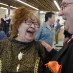 Photo by Rashah McChesney/Peninsula Clarion Rose Tepp, tribal chair for the Kenaitze Indian Tribe and Gary Hartz of the Indian Health Services laugh together during the grand opening of the Kenaitze Indian Tribe's new Dena'ina Wellness Center Thursday June 12, 2014 in Kenai, Alaska.